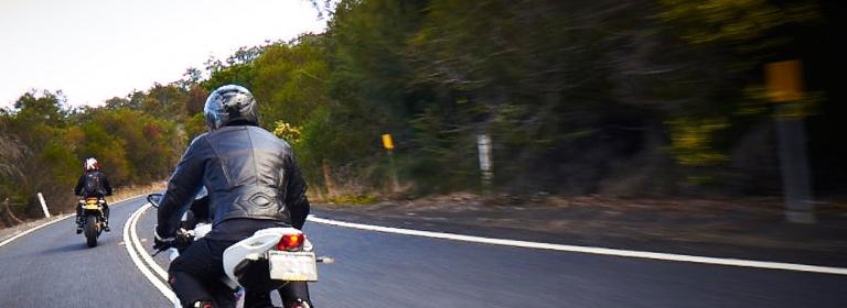 motorcyle rider on country road